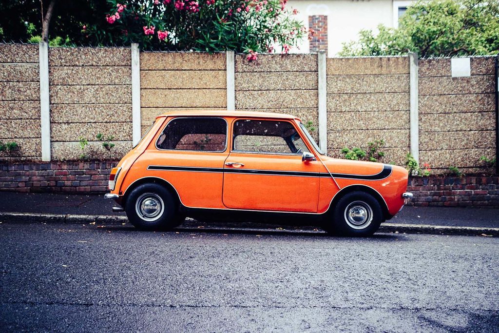 Image of a Mini Cooper parked by the street - Tinotenda Chemvura